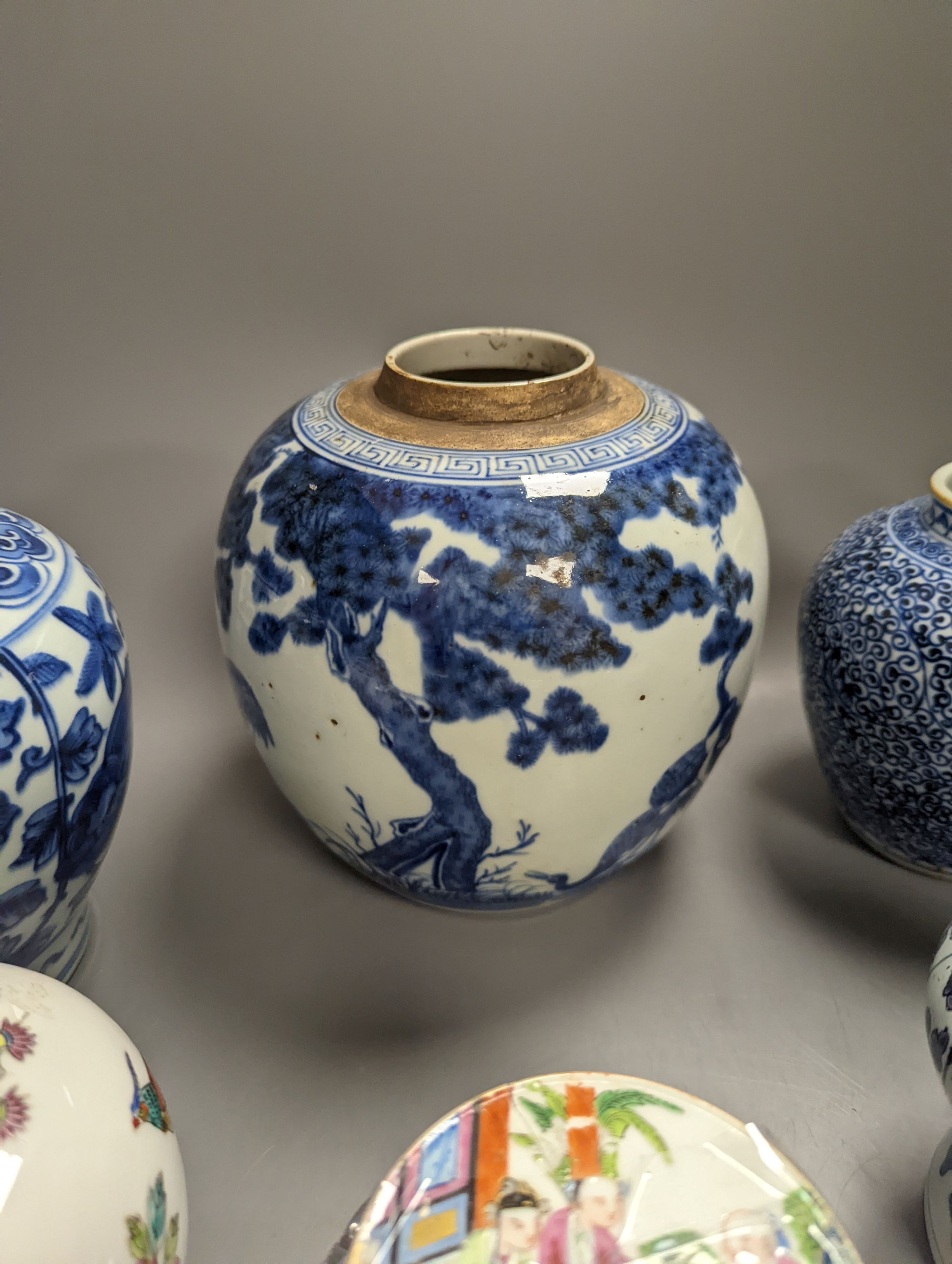 Four Chinese porcelain jars and a delft ware jar, 18cm and a pressed glass powder jar (a.f.)